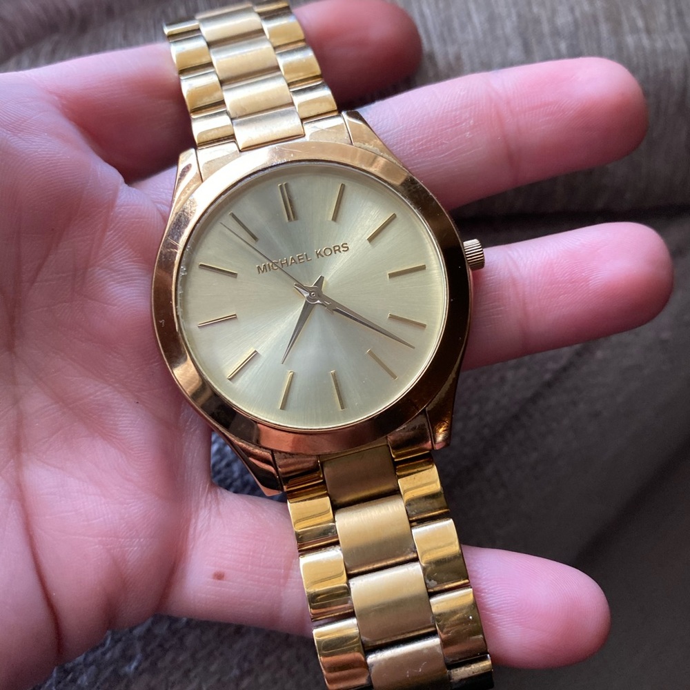 Michael Kors women’s slim gold watch